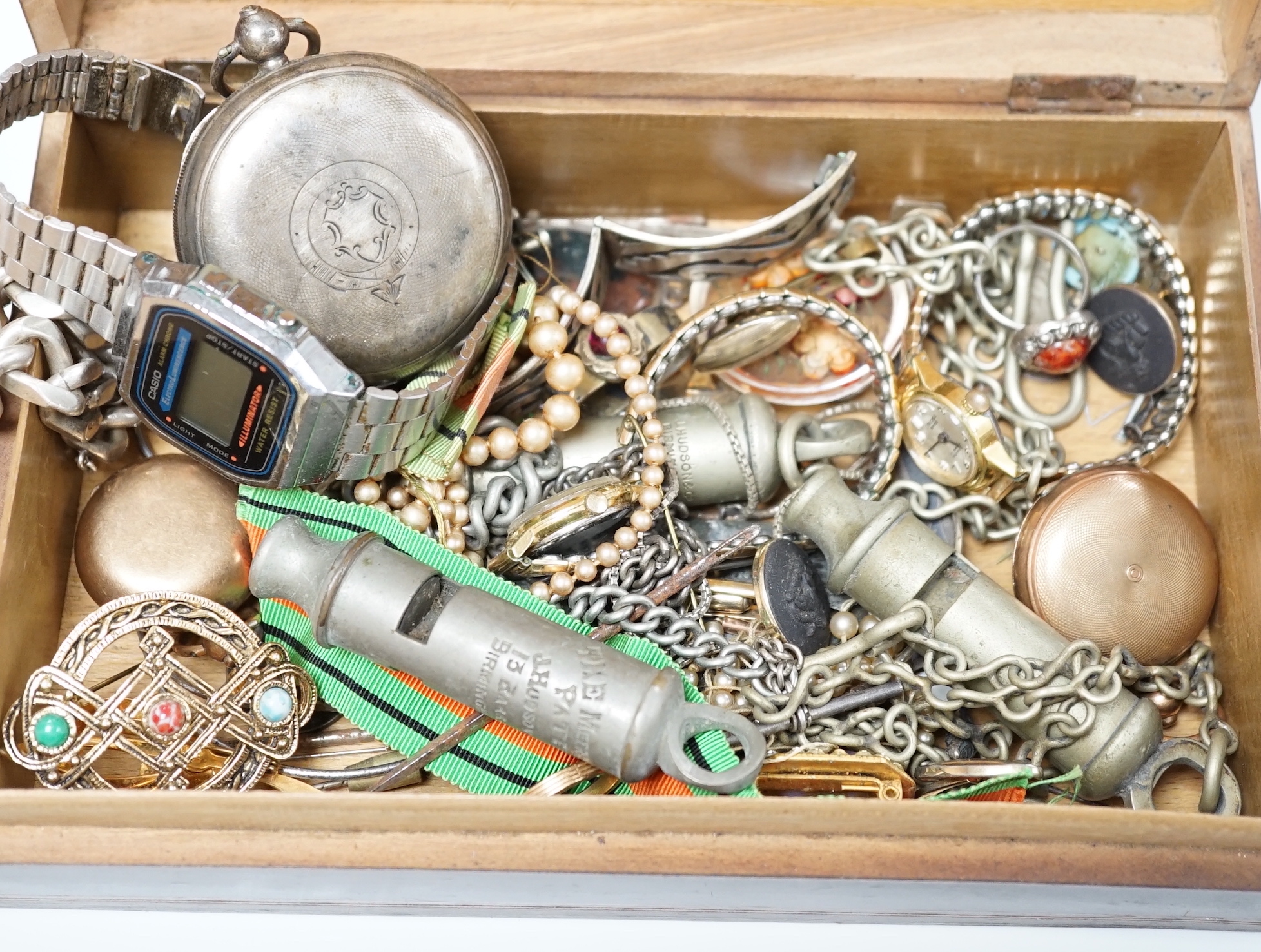 A heavy 925 curb link bracelet, a silver pocket watch by Graves of Sheffield, a gold plated sovereign case and other sundry jewellery etc. including costume and two whistles.